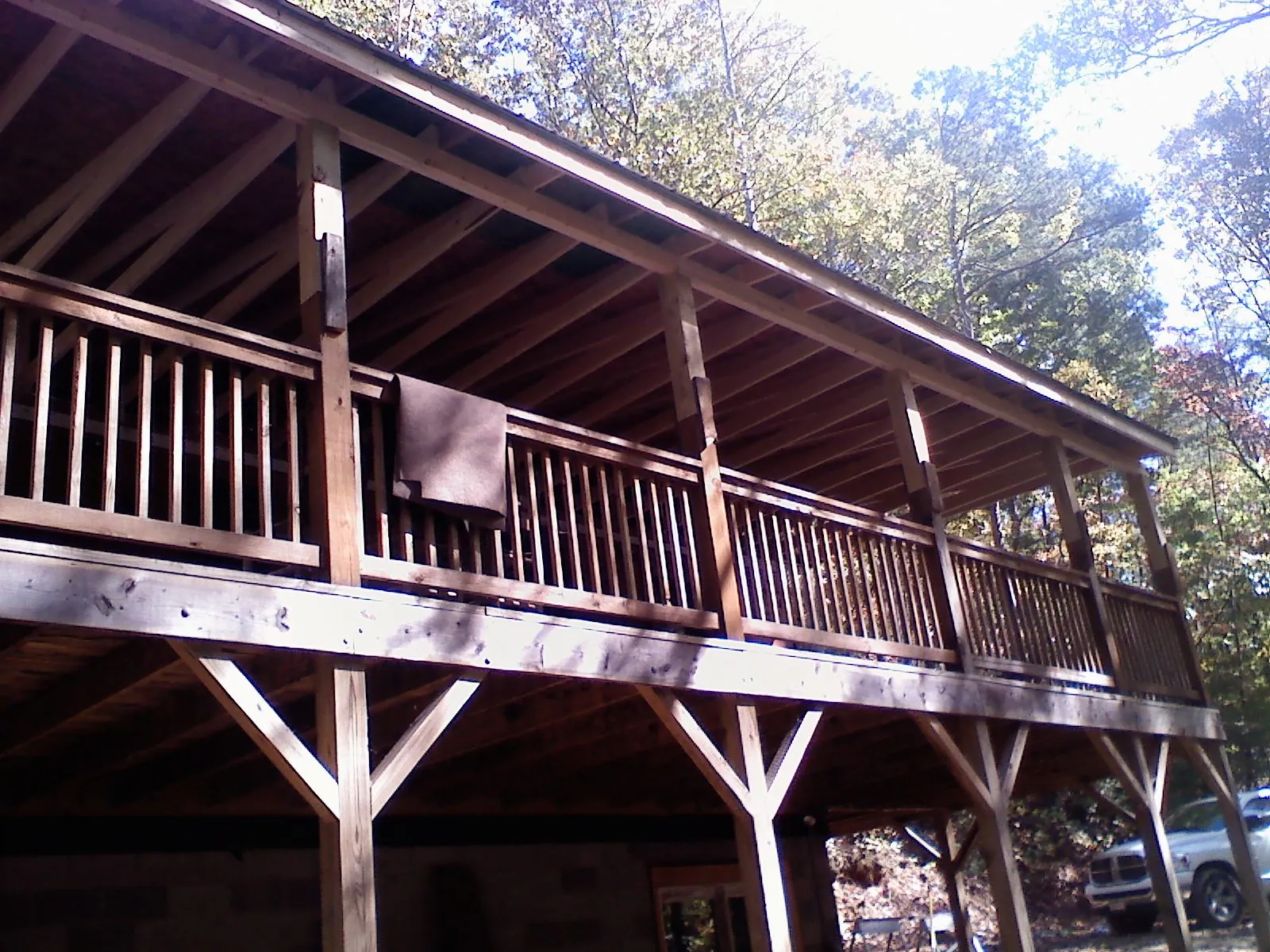 Timber framing under a new elevated porch and deck — Roof Leak Repair in Millers Creek by Roofing Brothers